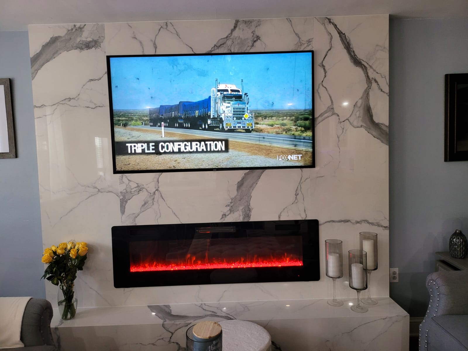 Completed living room with marble accent wall